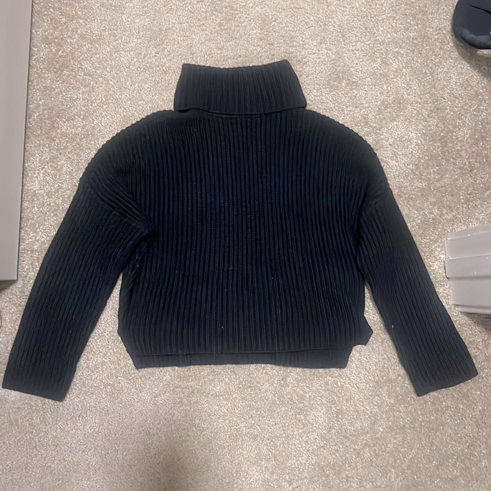 Black rubbed turtle neck sweater